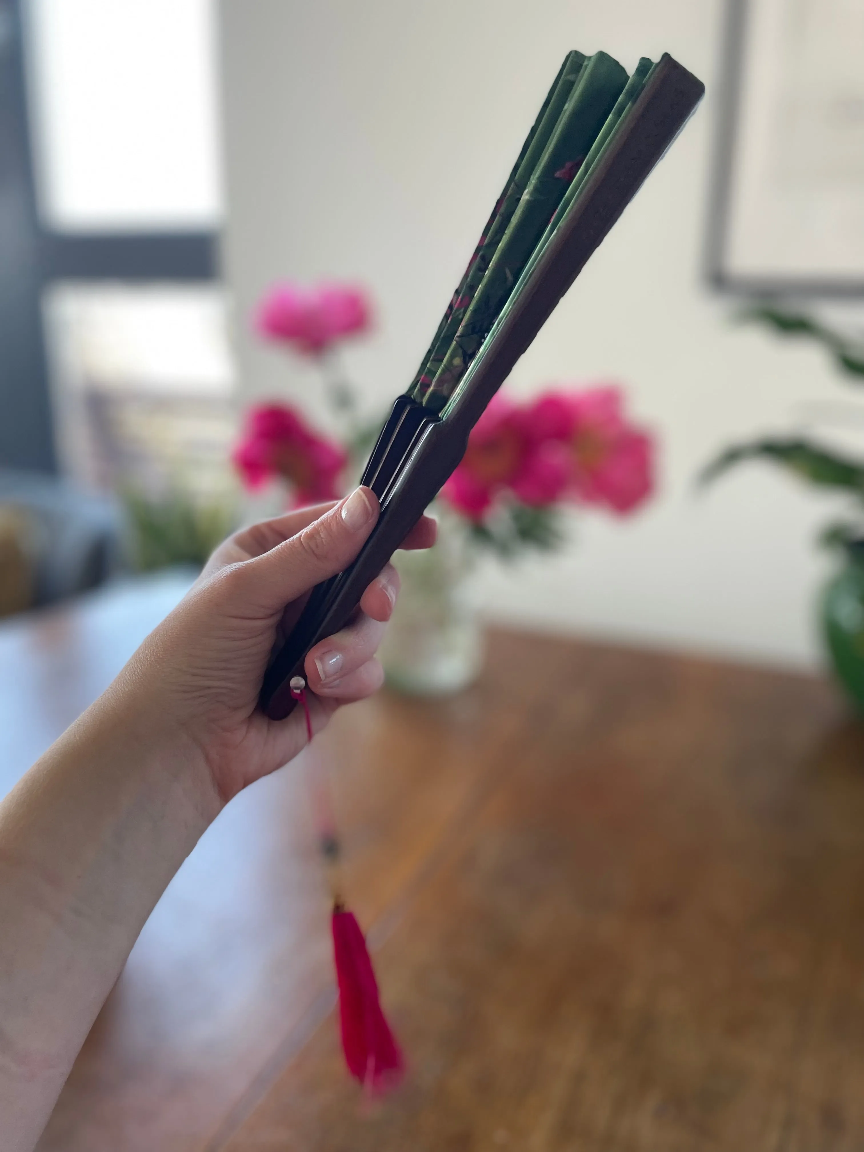 Green hand-held silk fan with 'Greenery' mushroom and crystal botanical artwork